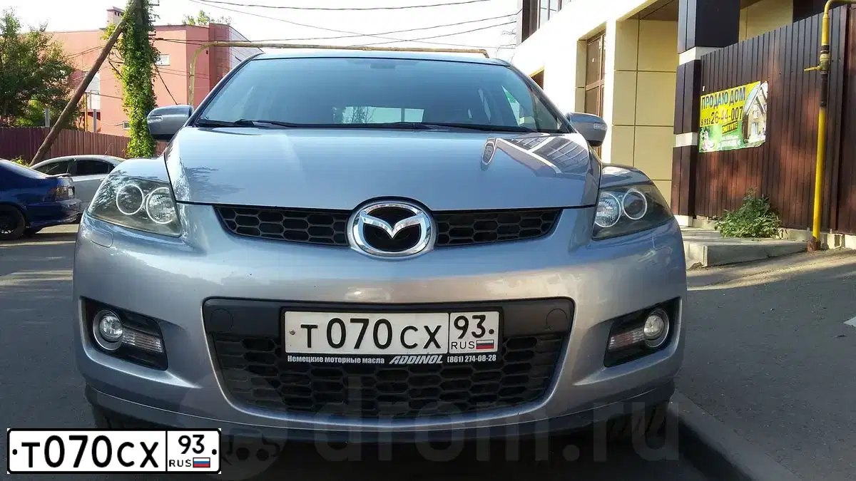 Фото автомобиля MAZDA CX-7, 2007 — госномер Т070СХ93. Цвет: СЕРЕБРИСТЫЙ
