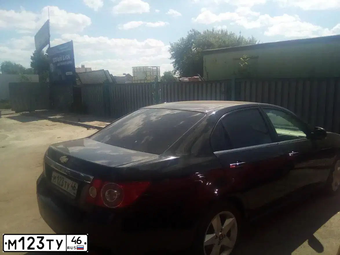 Фото автомобиля CHEVROLET EPICA, 2008 — госномер М123ТУ46. Цвет: ЧЕРНЫЙ