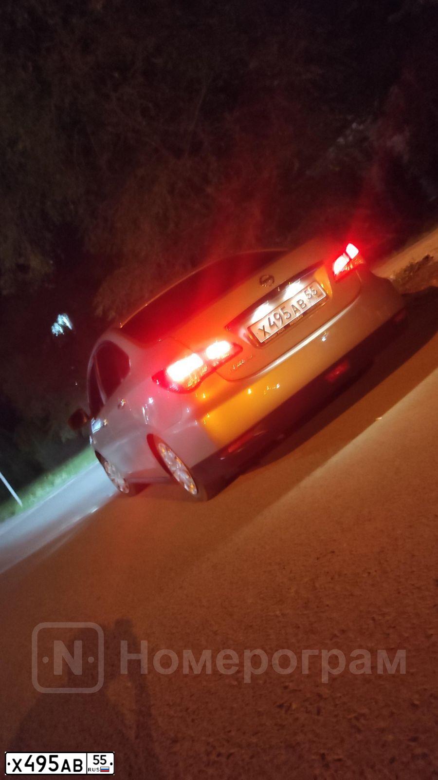 Фото автомобиля NISSAN ALMERA /AVTOVAZ/, 2015 — госномер Х495АВ55. Цвет: СЕРО БЕЖЕВЫЙ