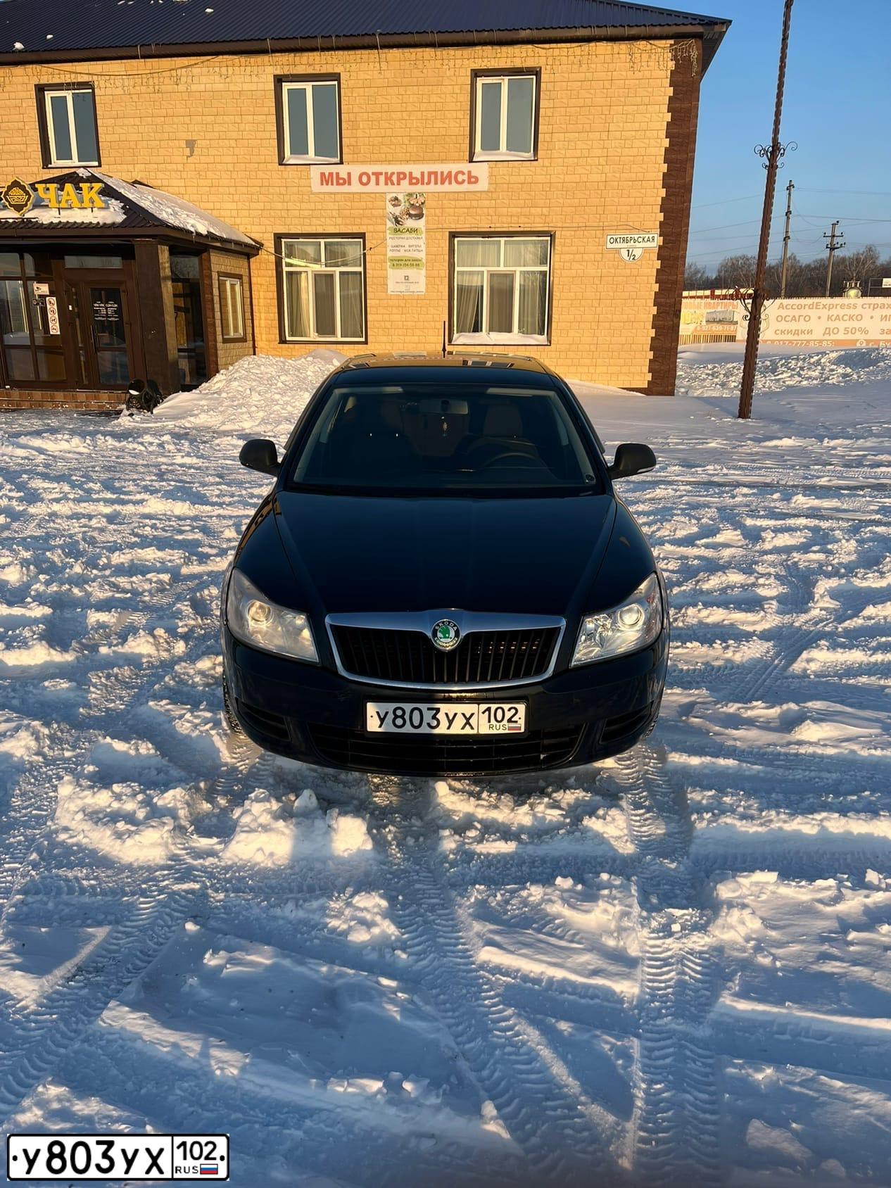 Фото автомобиля ШКОДА ОКТАВИЯ, 2012 — госномер М271СН35. Цвет: ЧЕРНЫЙ