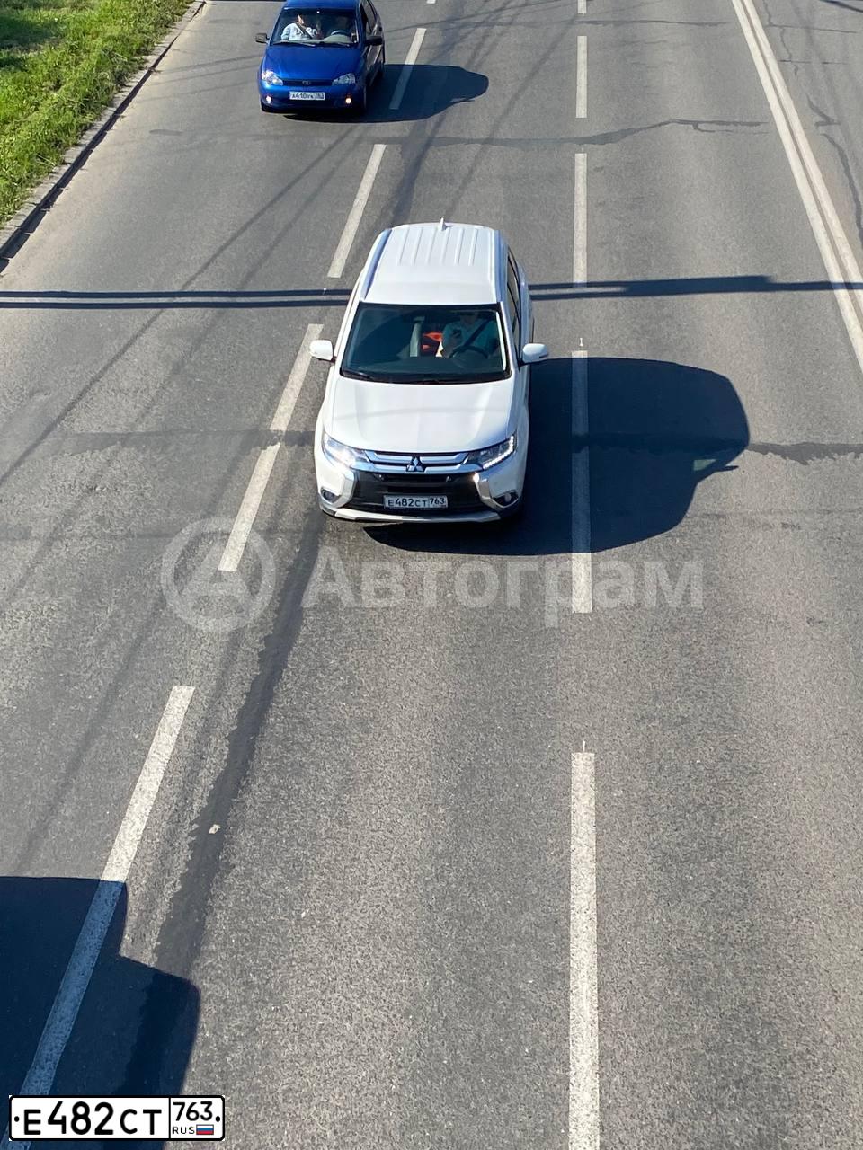 Фото автомобиля MITSUBISHI OUTLANDER, 2018 — госномер О230ЕА48. Цвет: Белый