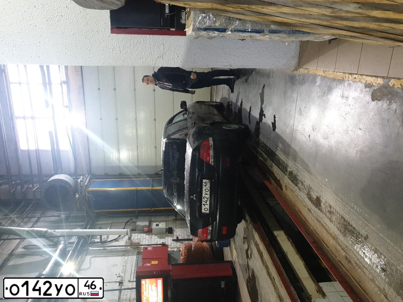 Фото автомобиля MITSUBISHI LANCER, 2006 — госномер К262НТ53. Цвет: ЧЕРНЫЙ