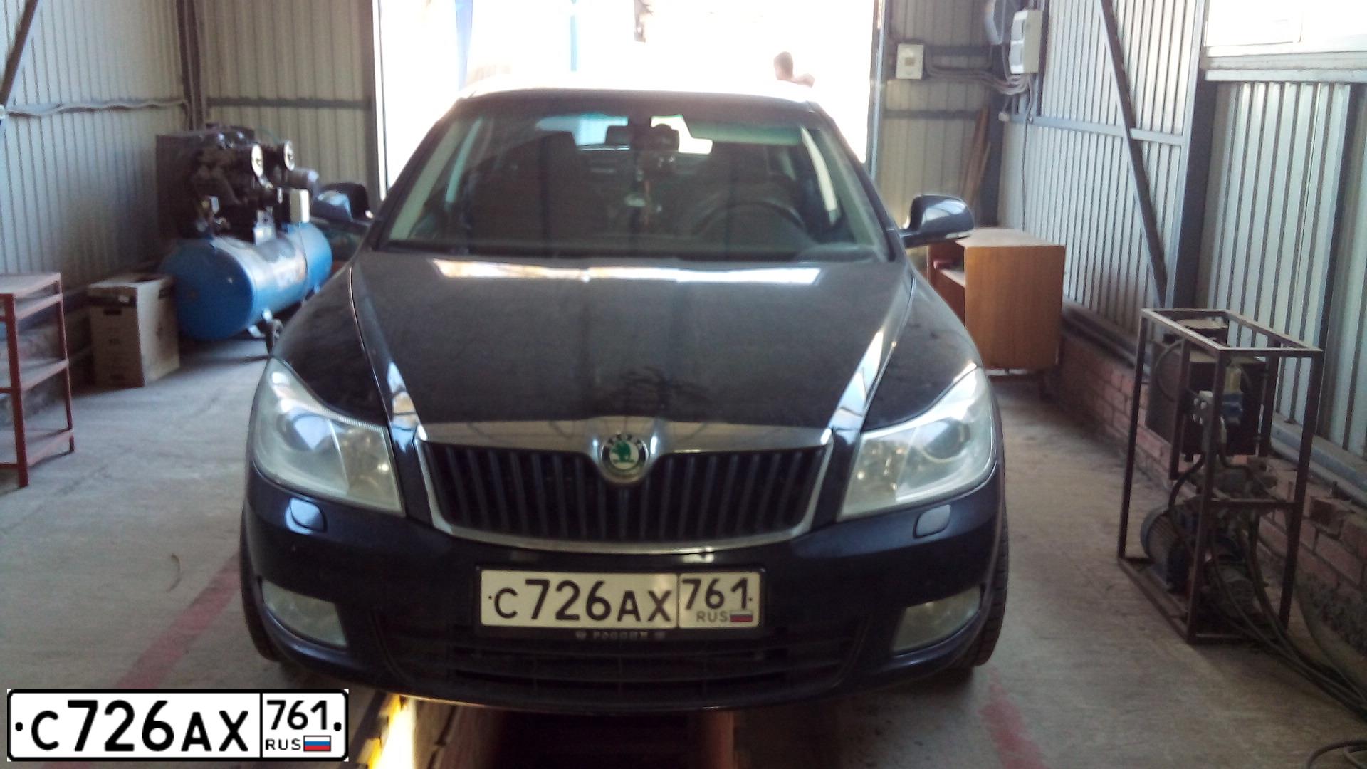 Фото автомобиля SKODA OCTAVIA, 2011 — госномер Т197ВА197. Цвет: ЧЕРНЫЙ