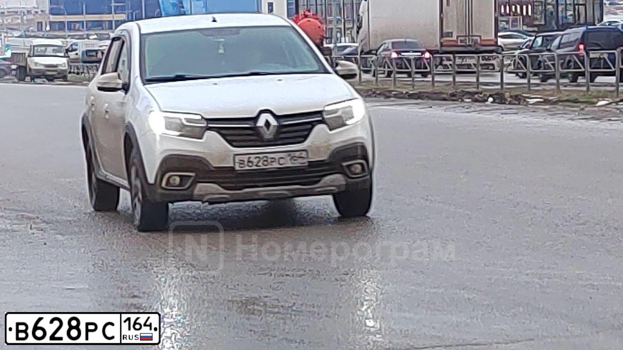 Фото автомобиля RENAULT LOGAN, 2019 — госномер В628РС164. Цвет: Белый