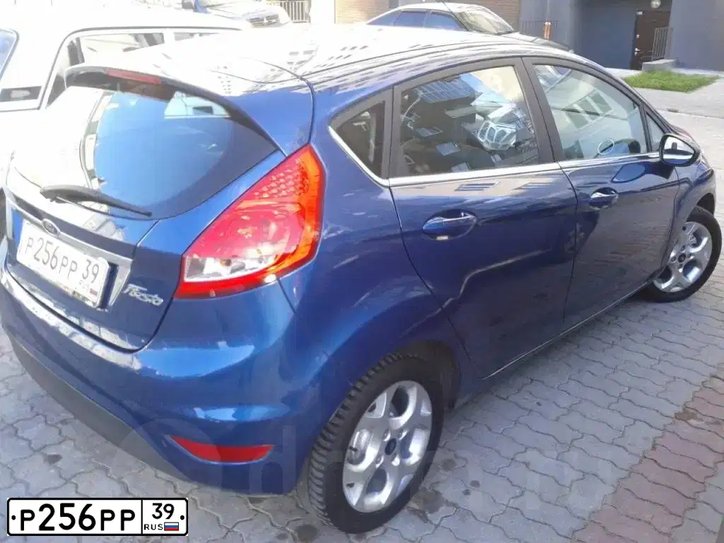 Фото автомобиля NISSAN QASHQAI, 2007 — госномер Р256РР39. Цвет: Серый