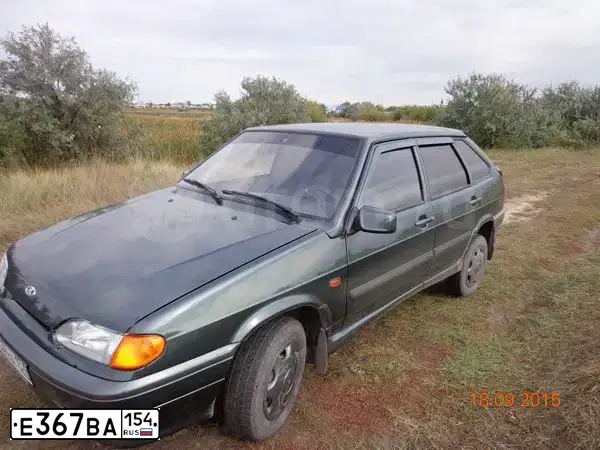 Фото автомобиля LADA 2114 SAMARA, 2011 — госномер Е367ВА154. Цвет: СЕРО-СИНЕ-ЗЕЛЕНЫЙ
