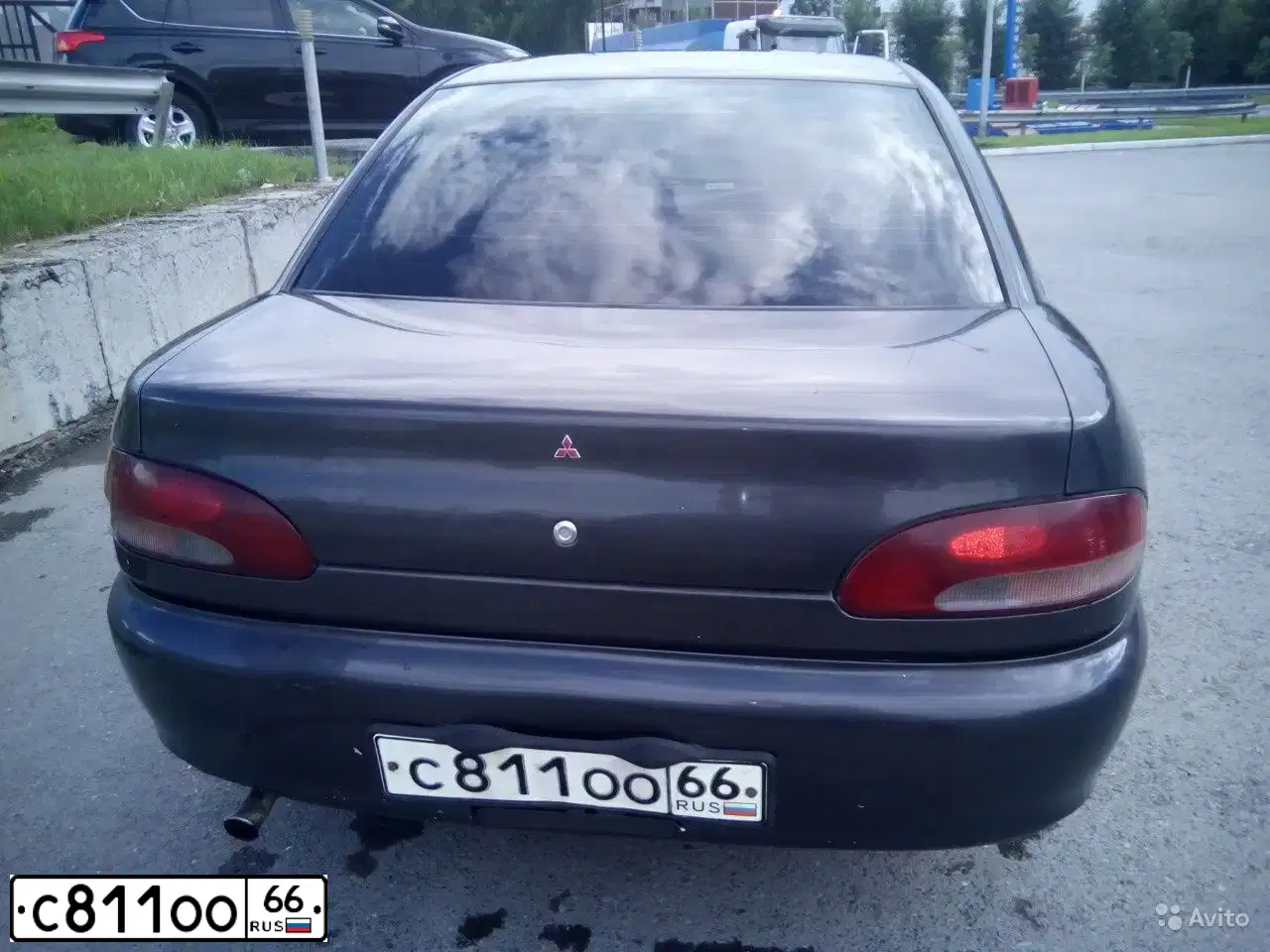 Фото автомобиля MITSUBISHI MIRAGE, 1995 — госномер К126ОС702