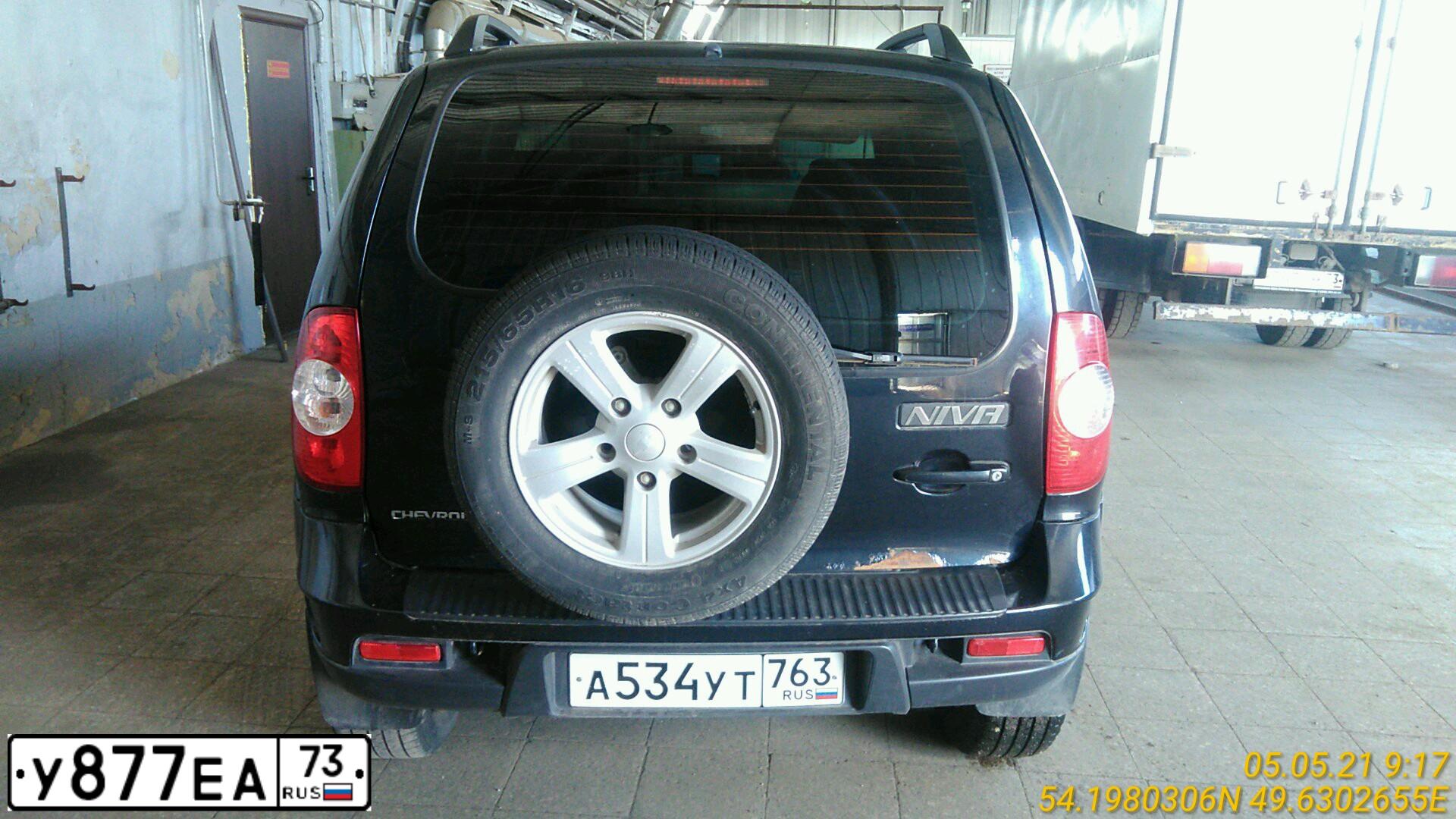 Фото автомобиля CHEVROLET NIVA, 2013 — госномер М815РХ73. Цвет: Черно-синий металлик