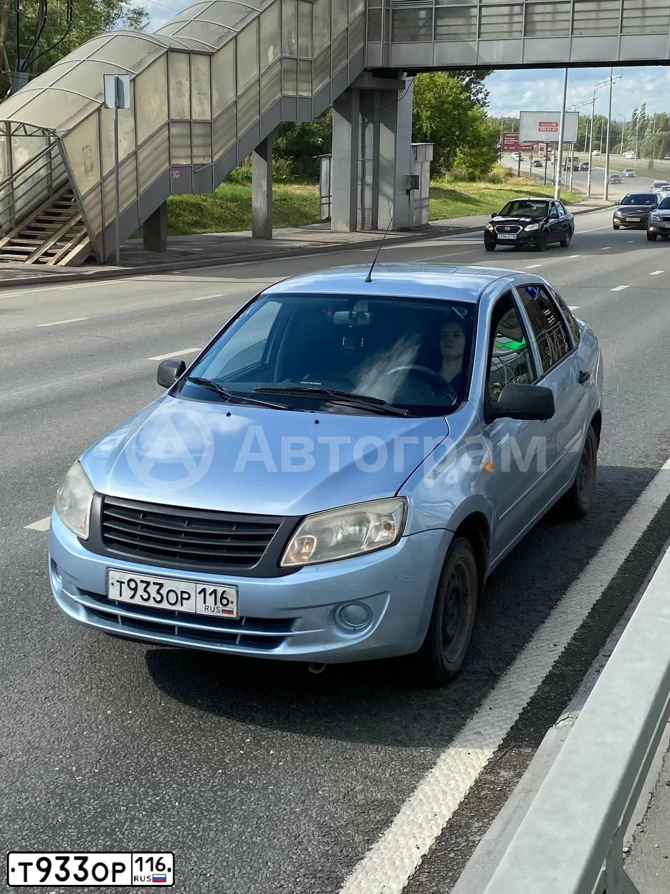 Фото автомобиля LADA 2190 GRANTA, 2013 — госномер Т933ОР116. Цвет: ГОЛУБОЙ