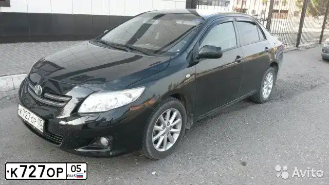Фото автомобиля TOYOTA COROLLA, 2008 — госномер К727ОР05. Цвет: ЧЕРНЫЙ