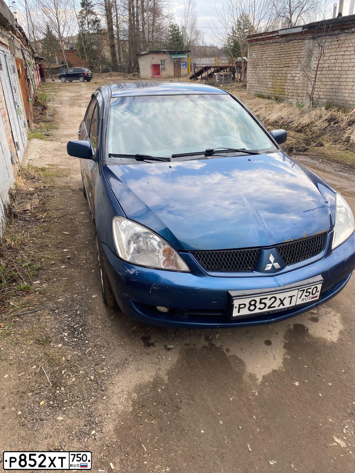 Фото автомобиля MITSUBISHI LANCER, 2005 — госномер Р852ХТ750. Цвет: синий