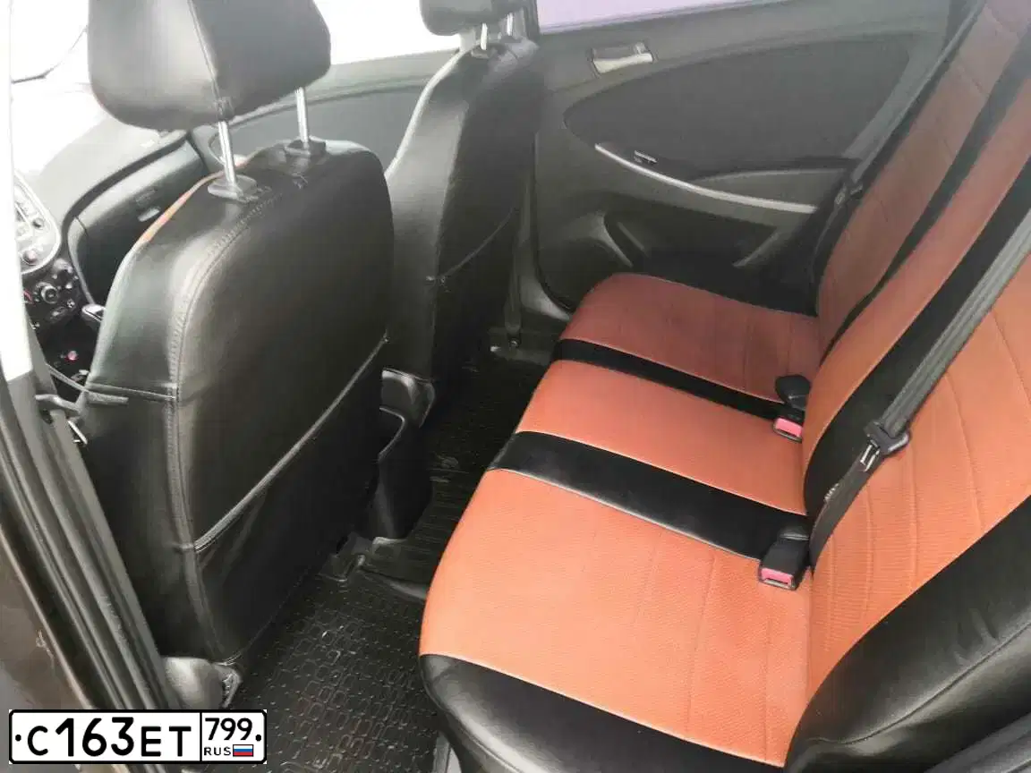 Фото автомобиля HYUNDAI SOLARIS, 2015 — госномер С163ЕТ799. Цвет: Коричневый