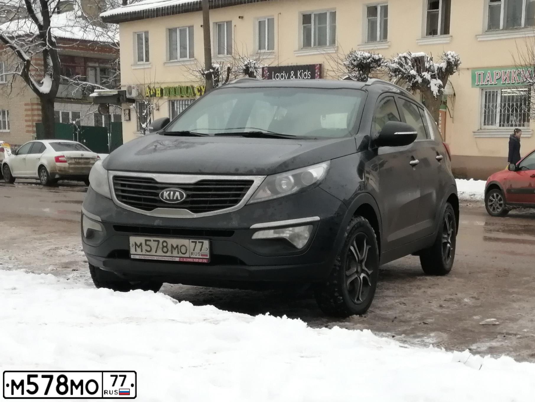 Фото автомобиля KIA SPORTAGE, 2013 — госномер М578МО77. Цвет: ЧЕРНЫЙ