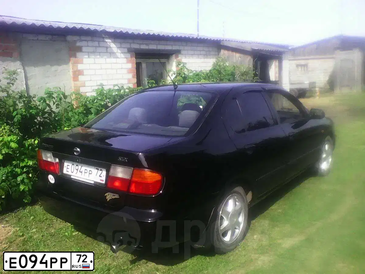 Фото автомобиля NISSAN PRIMERA, 1998 — госномер А527НС172. Цвет: ЧЕРНЫЙ