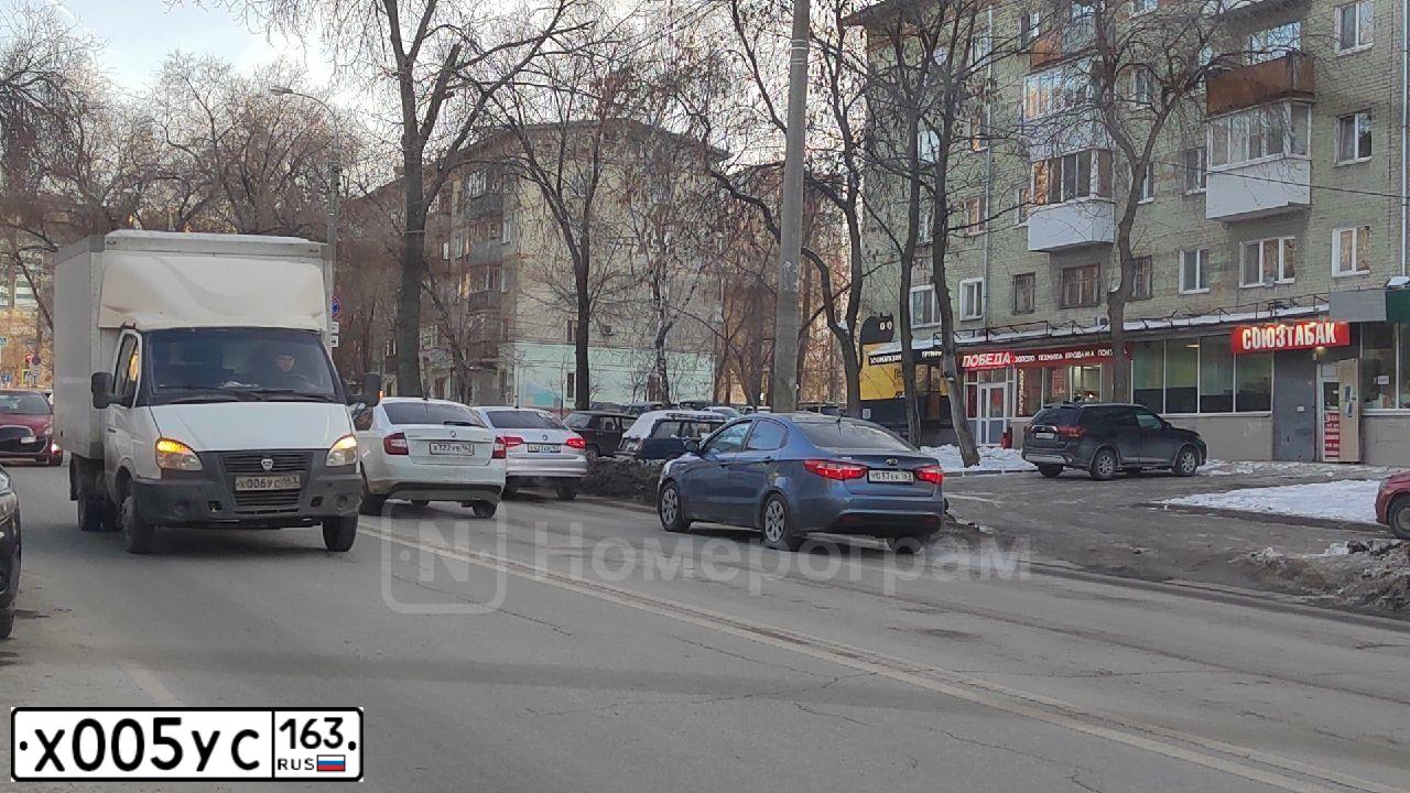 Фото автомобиля VOLKSWAGEN TIGUAN, 2018 — госномер Х005УС163. Цвет: ЧЕРНЫЙ