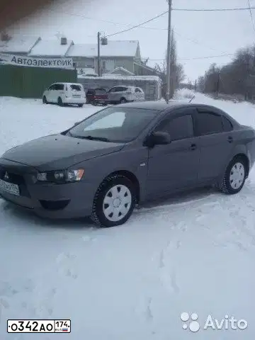 Фото автомобиля MITSUBISHI LANCER, 2007 — госномер Х405АУ56. Цвет: СЕРЫЙ