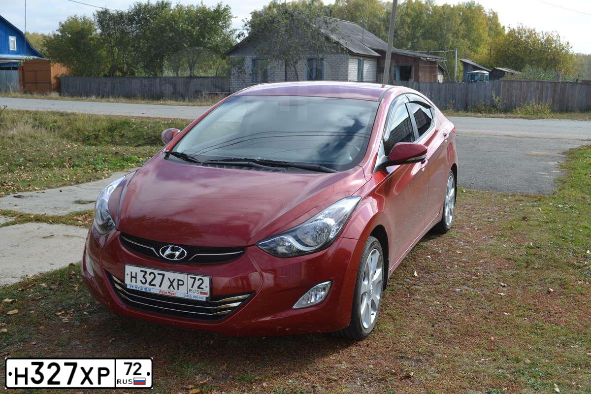 Фото автомобиля HYUNDAI ELANTRA, 2011 — госномер Н327ХР72. Цвет: Красный