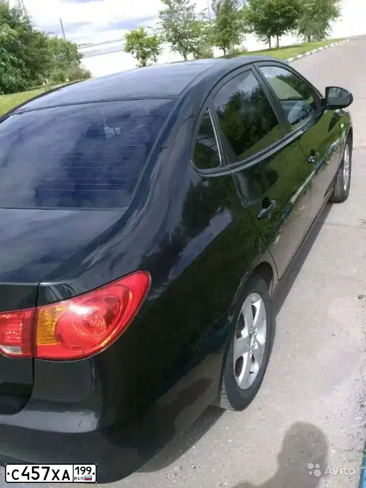 Фото автомобиля HYUNDAI ELANTRA, 2006 — госномер Е956ВР08. Цвет: ЧЕРНЫЙ