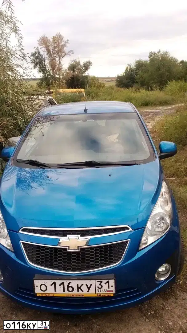 Фото автомобиля CHEVROLET SPARK, 2011 — госномер О116КУ31. Цвет: СИНИЙ