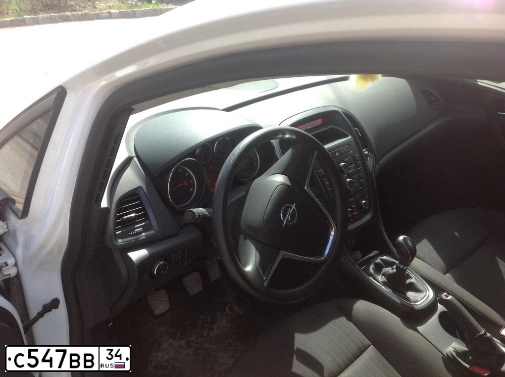 Фото автомобиля OPEL ASTRA, 2011 — госномер С547ВВ34. Цвет: Белый
