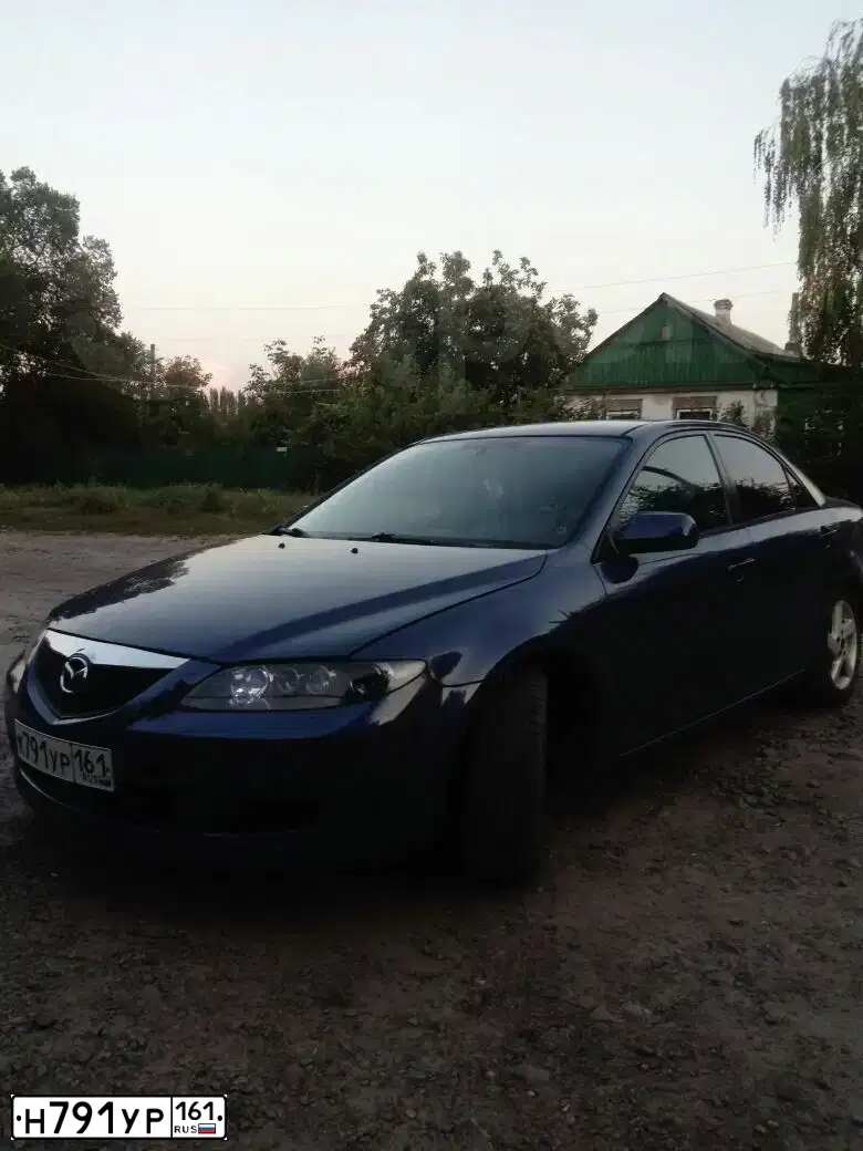 Фото автомобиля HAWTAI BOLIGER, 2014 — госномер Н791УР161. Цвет: ЧЕРНЫЙ