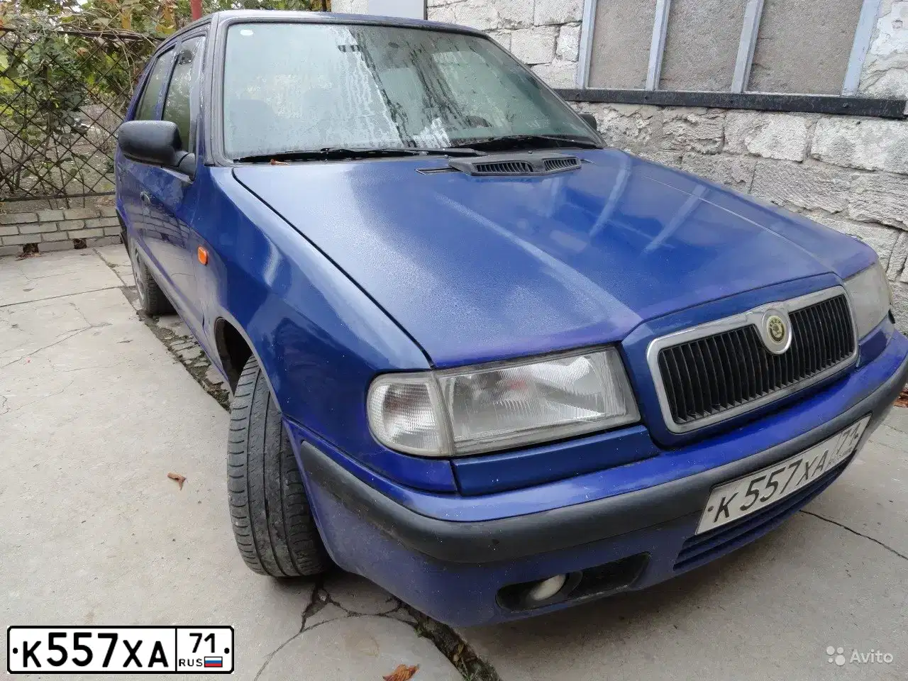 Фото автомобиля SKODA FELICIA, 1998 — госномер К557ХА71. Цвет: ТЕМНО-СИНИЙ