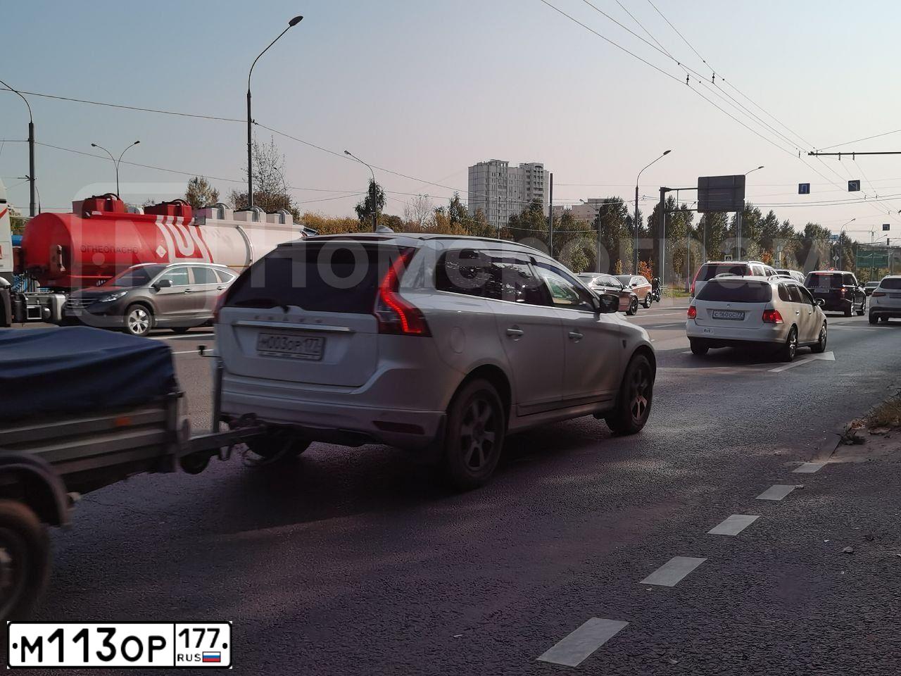 Фото автомобиля TOYOTA COROLLA, 2004 — госномер Н119АХ70. Цвет: Серебристый