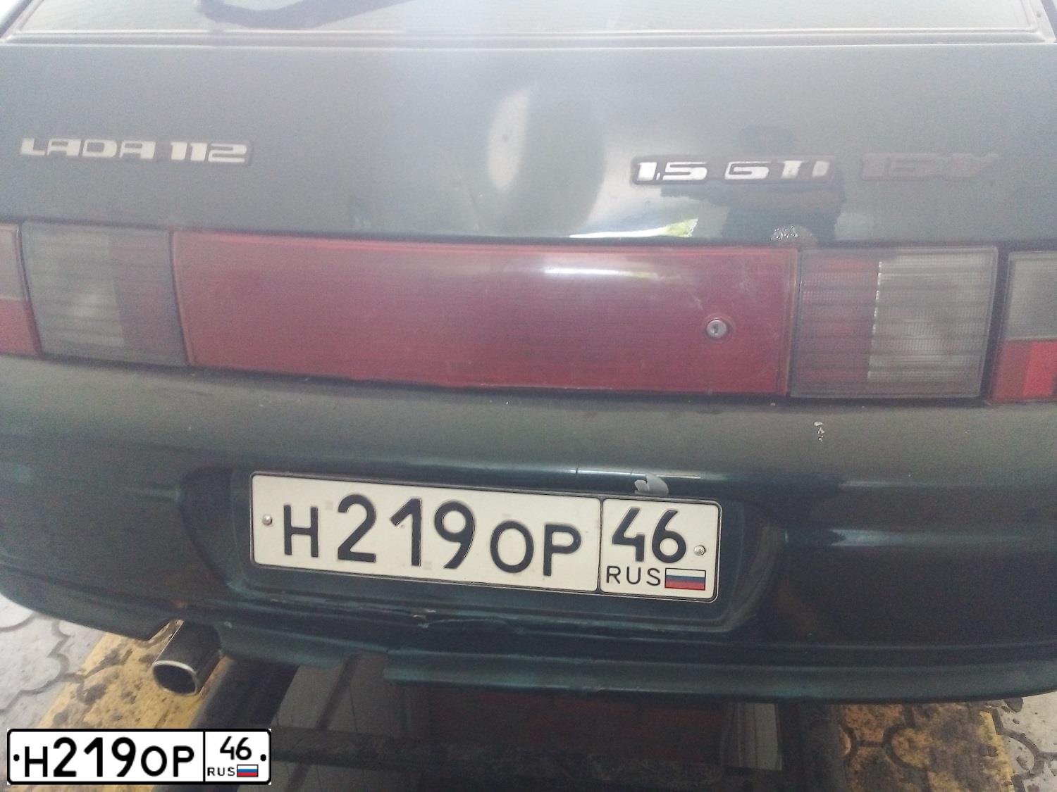 Фото автомобиля LADA 2112, 2004 — госномер Н219ОР46. Цвет: Темно-зеленый