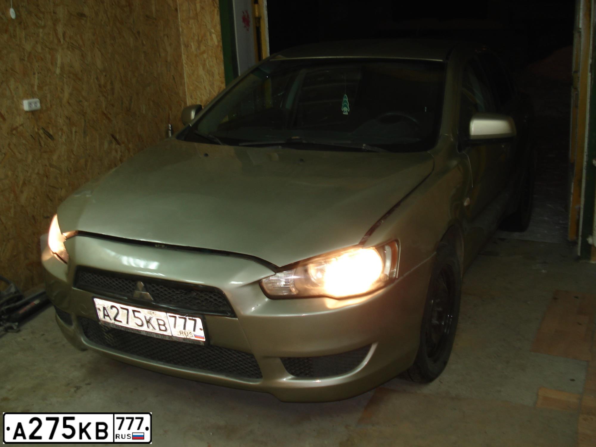 Фото автомобиля MITSUBISHI LANCER, 2008 — госномер Е033КО70. Цвет: БЕЖЕВЫЙ