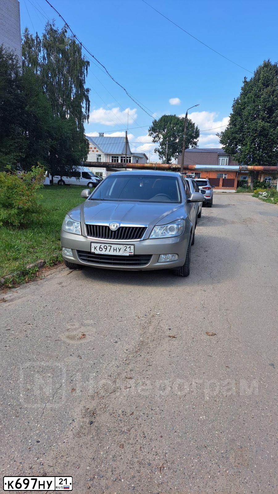 Фото автомобиля SKODA OCTAVIA, 2013 — госномер К697НУ21. Цвет: БЕЖЕВЫЙ