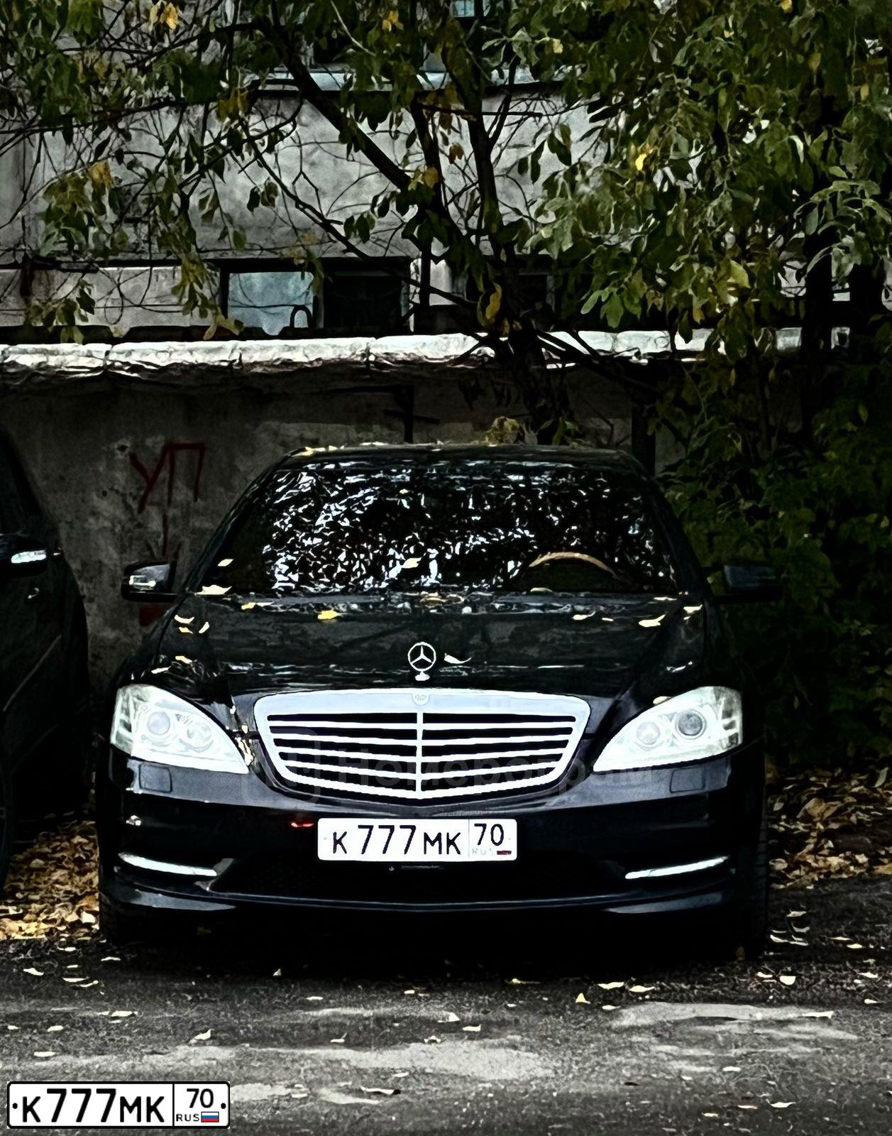 Фото автомобиля LADA 2190 GRANTA, 2014 — госномер К777МК70. Цвет: ЧЕРНЫЙ