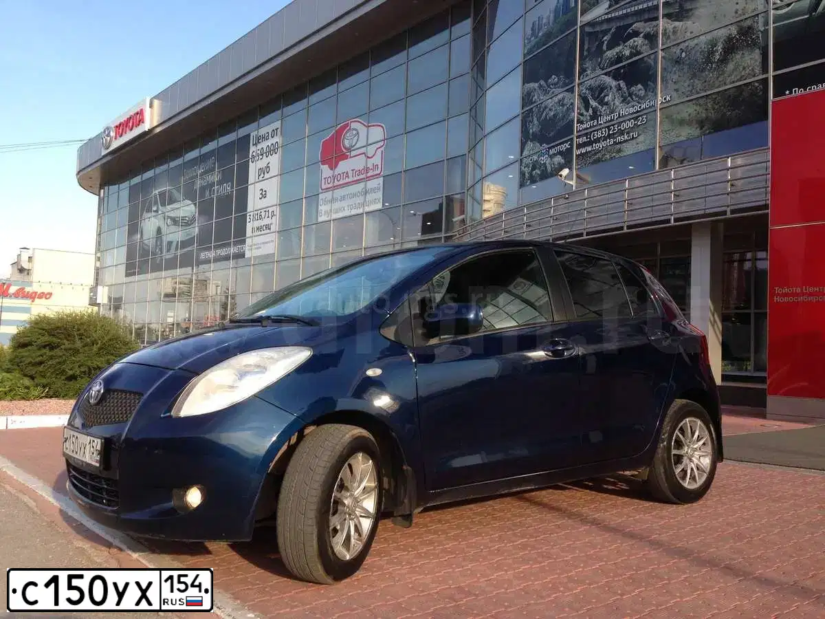 Фото автомобиля TOYOTA YARIS, 2006 — госномер К753АС154. Цвет: ТЕМНО СИНИЙ