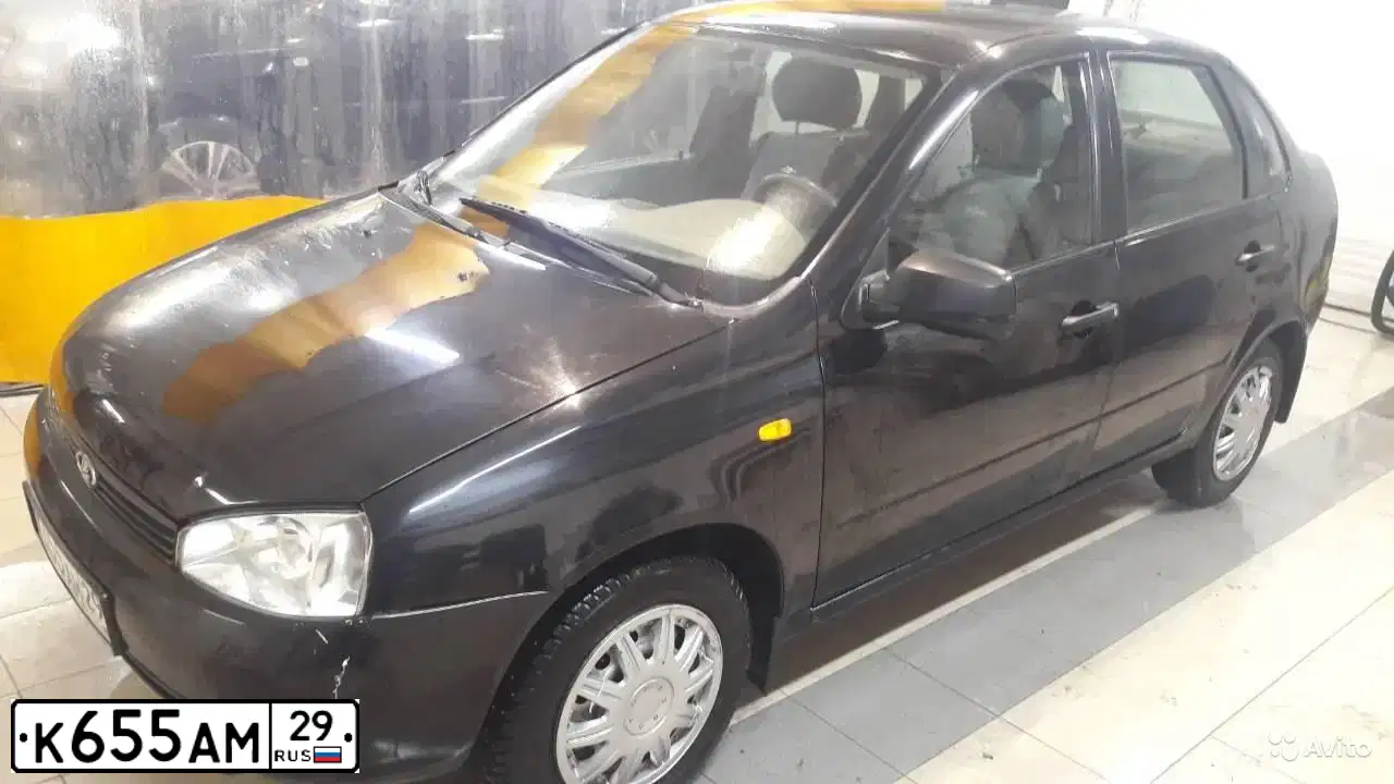 Фото автомобиля LADA 1118 KALINA, 2010 — госномер О849АК29. Цвет: ЧЕРНЫЙ
