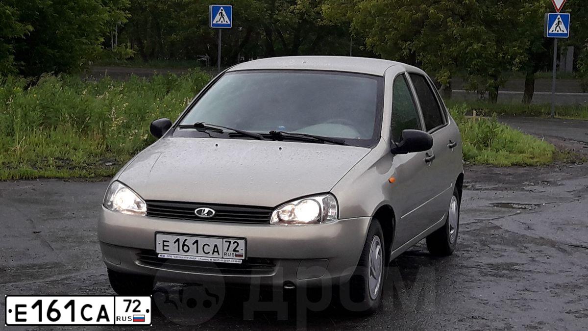 Фото автомобиля LADA 1118 KALINA, 2005 — госномер Е161СА72. Цвет: БЕЖЕВО-СЕРЫЙ