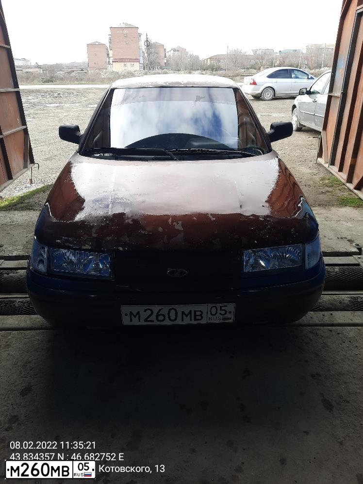 Фото автомобиля LADA 2112, 2002 — госномер М260МВ05. Цвет: Портвейн