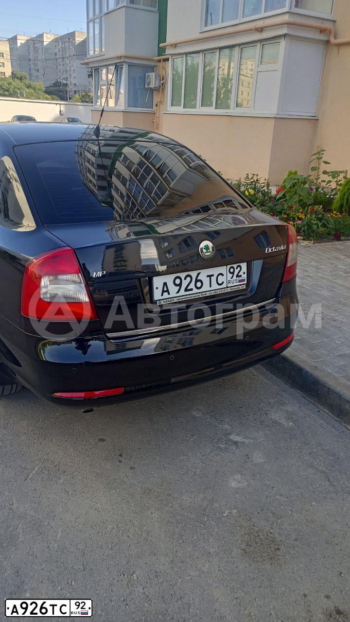 Фото автомобиля SKODA OCTAVIA, 2011 — госномер А926ТС92. Цвет: ЧЕРНЫЙ