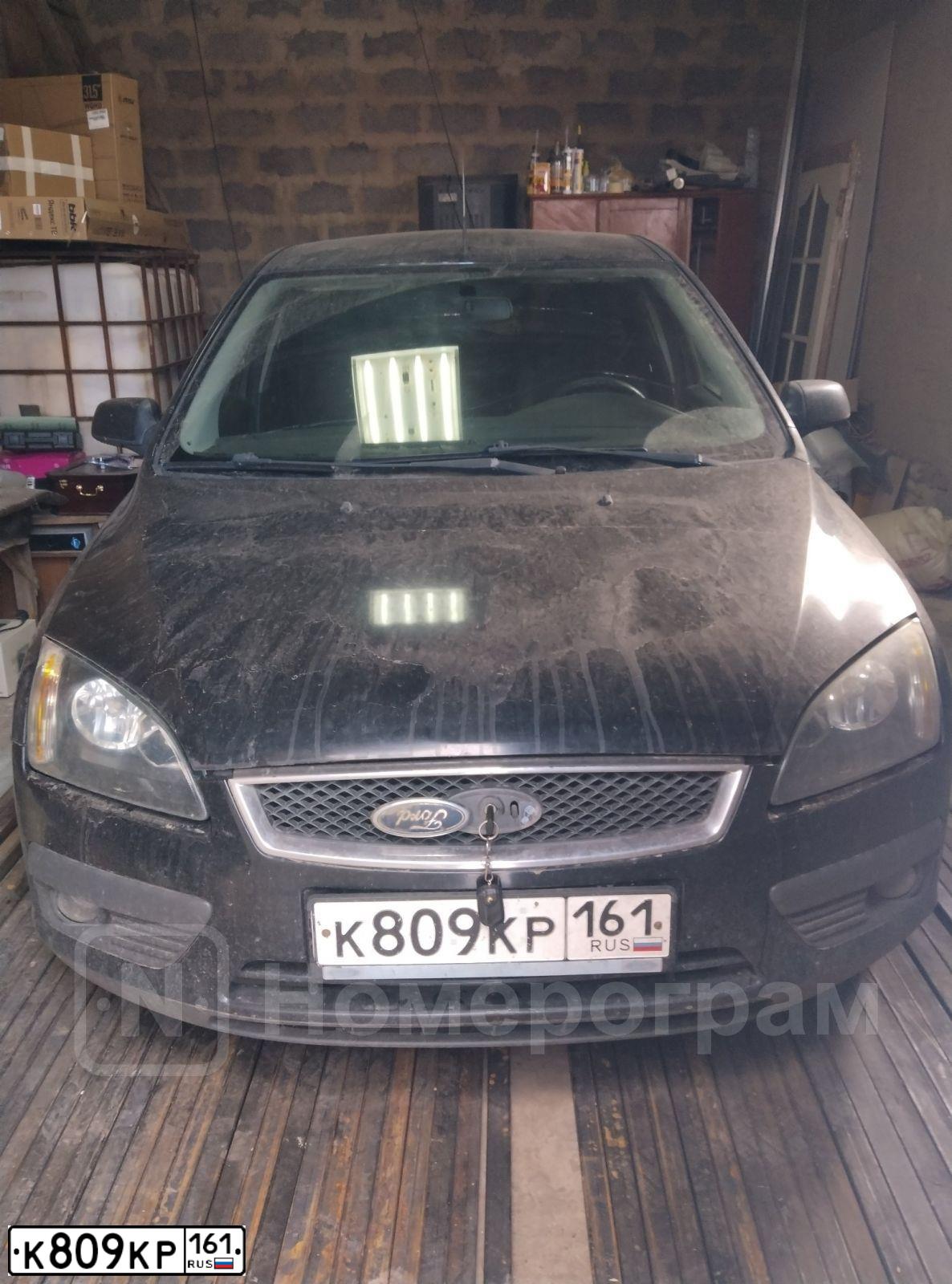 Фото автомобиля FORD FOCUS, 2006 — госномер К809КР161. Цвет: ЧЕРНЫЙ
