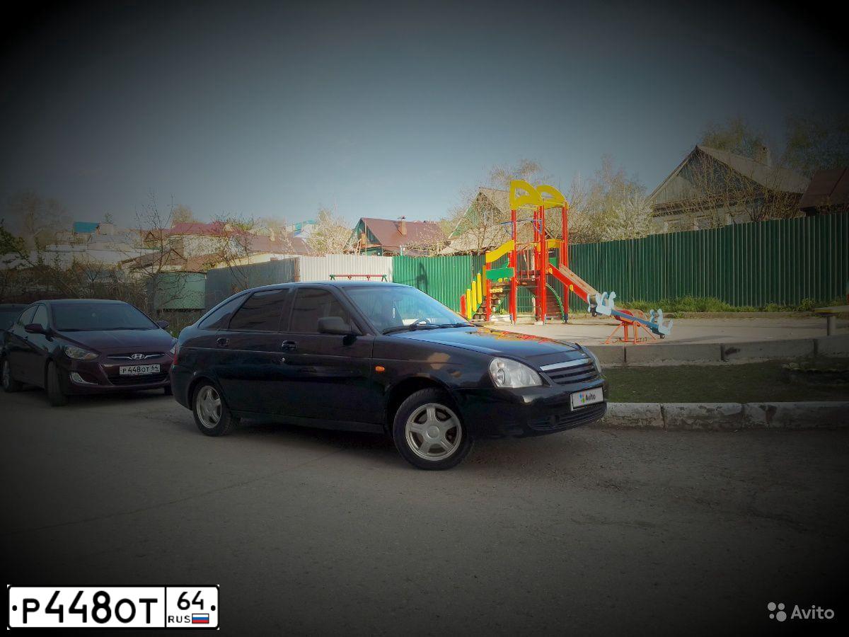 Фото автомобиля RENAULT LOGAN, 2009 — госномер Р448ОТ64. Цвет: ТЕМНО СЕРЫЙ