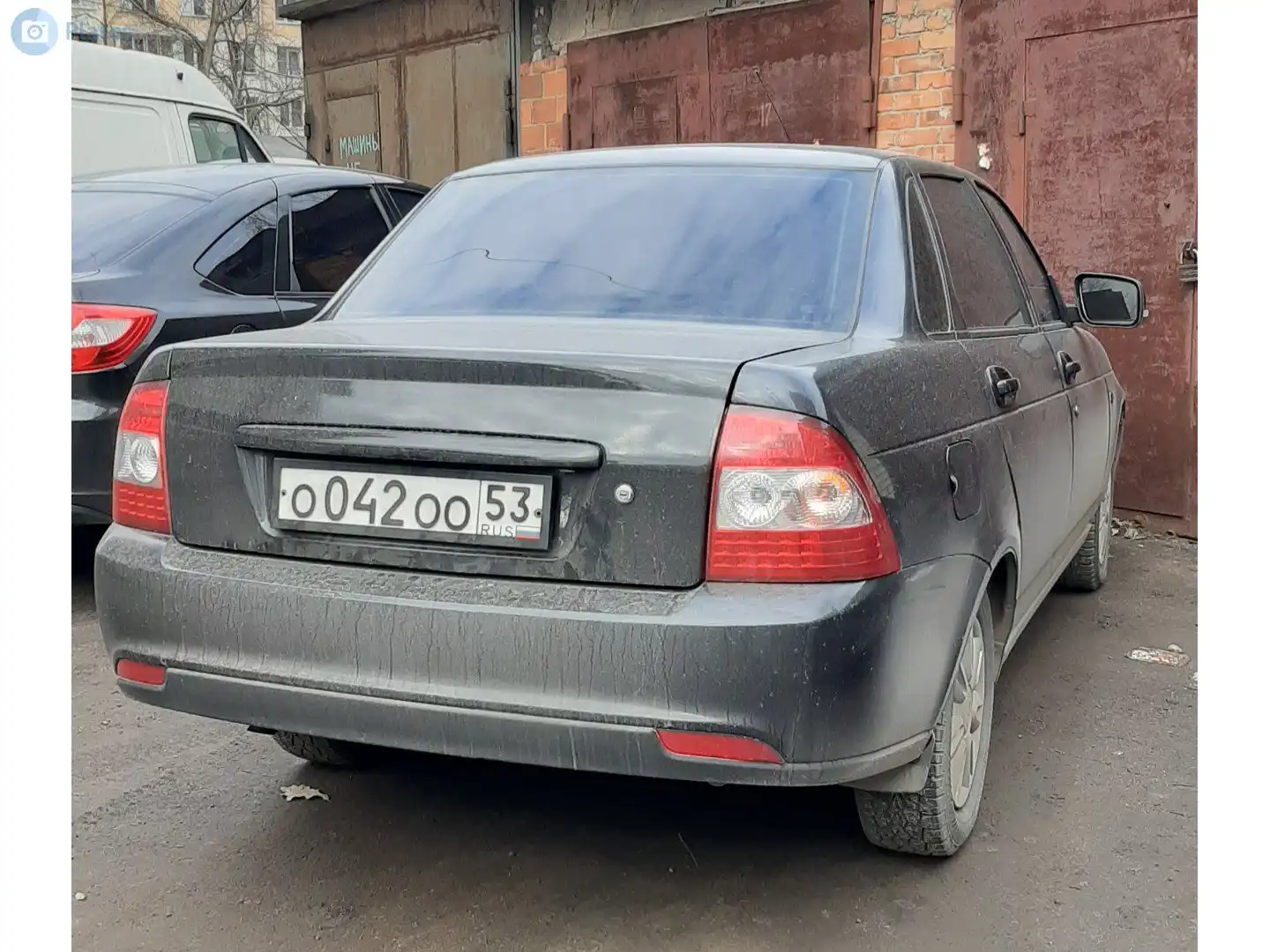 Фото автомобиля LADA 1118 KALINA, 2005 — госномер О042ОО53. Цвет: СЕРЕБРИСТО-КРАСНЫЙ