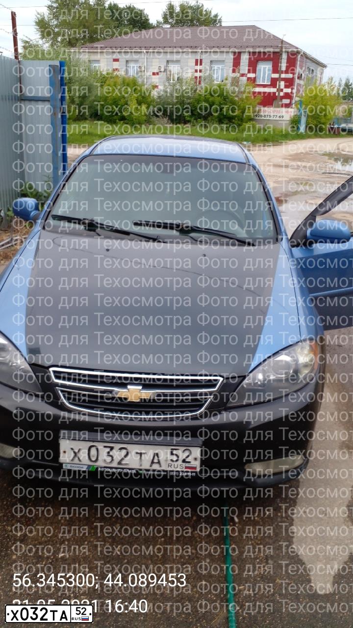 Фото автомобиля CHEVROLET LACETTI, 2004 — госномер Х032ТА52. Цвет: синий