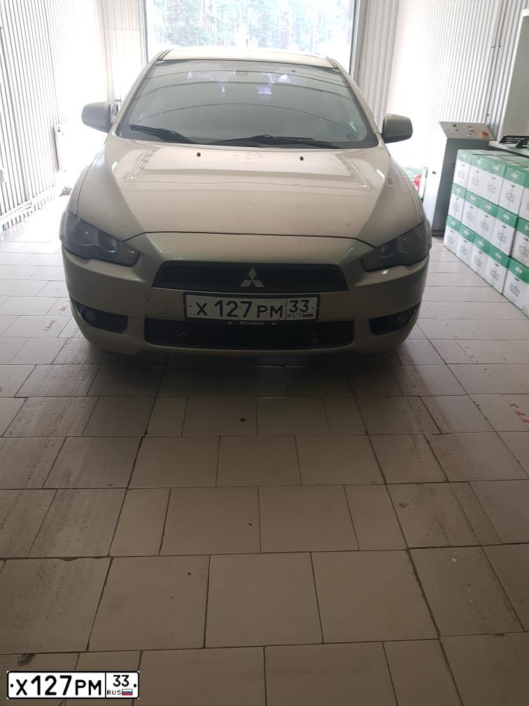 Фото автомобиля MITSUBISHI LANCER, 2008 — госномер А255СХ252. Цвет: БЕЖЕВЫЙ