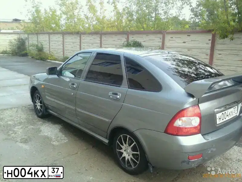 Фото автомобиля LADA 2109 SAMARA, 1998 — госномер М004КХ37. Цвет: ЯРКО-ЗЕЛЕНЫЙ