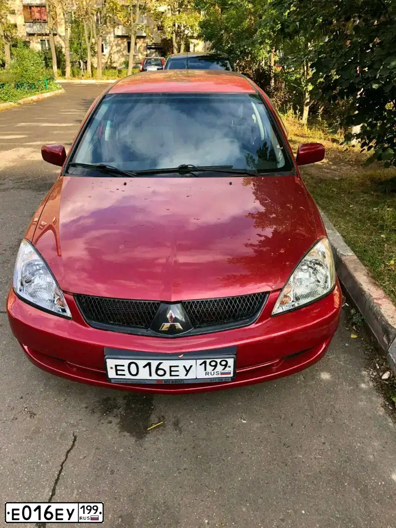 Фото автомобиля КМЗ8136, 1995 — госномер Е016ЕУ199. Цвет: СЕРЫЙ