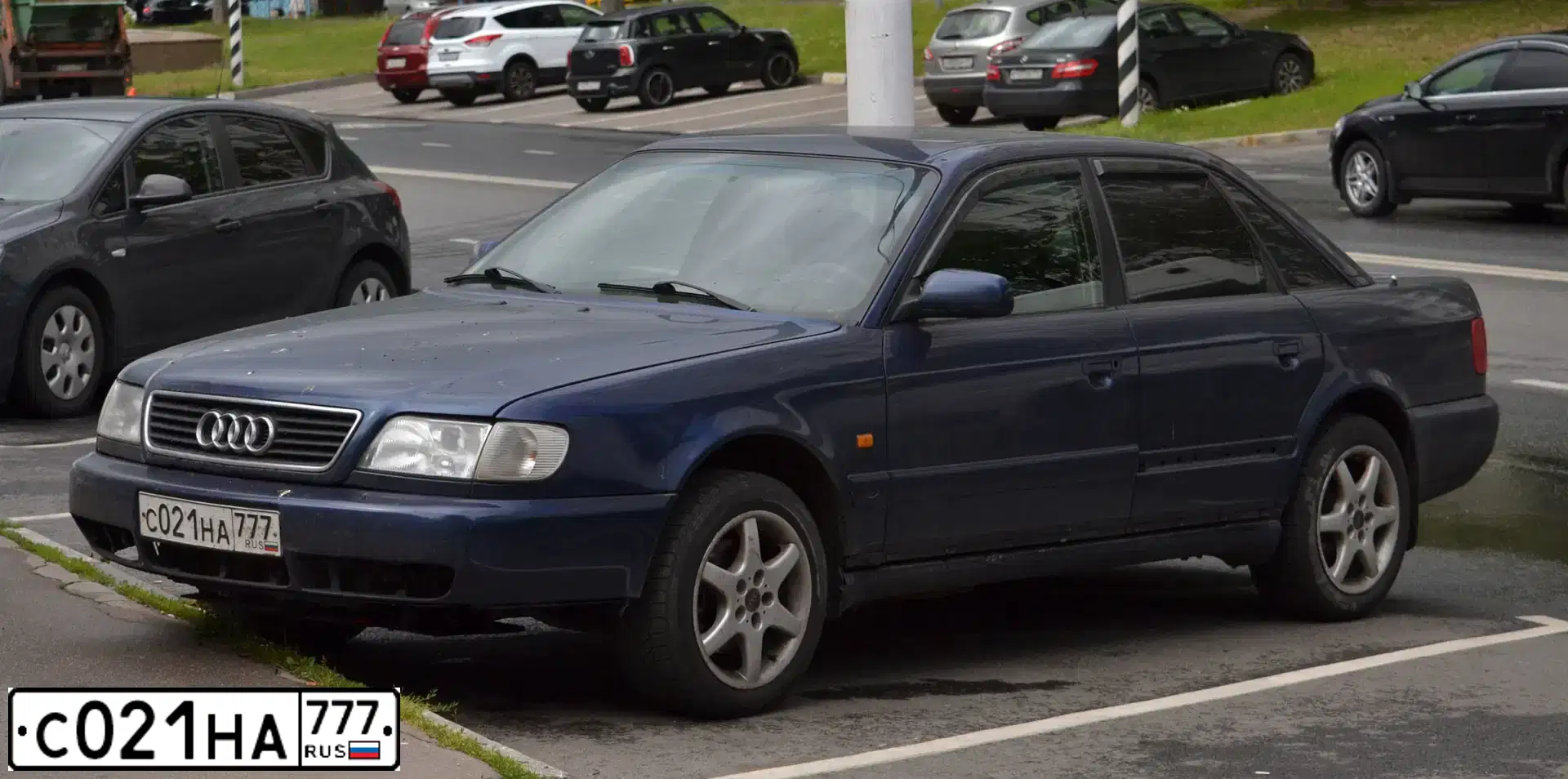 Фото автомобиля AUDI A6, 1996 — госномер С021НА777. Цвет: СИНИЙ ТЕМНЫЙ