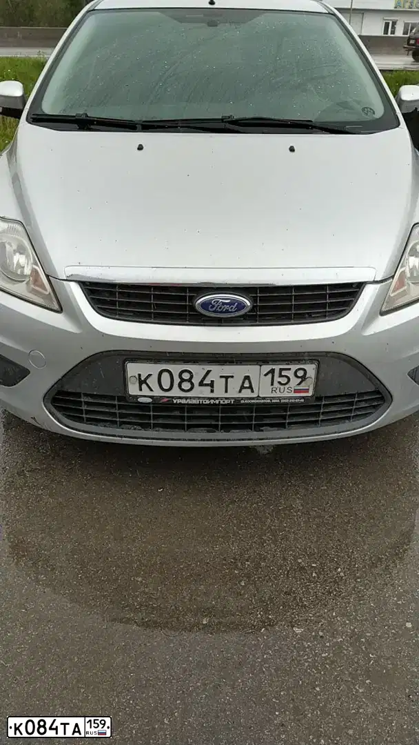 Фото автомобиля FORD FOCUS, 2008 — госномер К084ТА159. Цвет: СВЕТЛО СЕРЫЙ