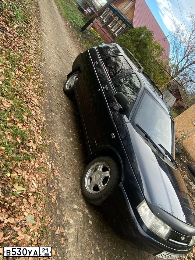 Фото автомобиля LADA 2111, 2005 — госномер Н659РУ21. Цвет: ЧЕРНЫЙ