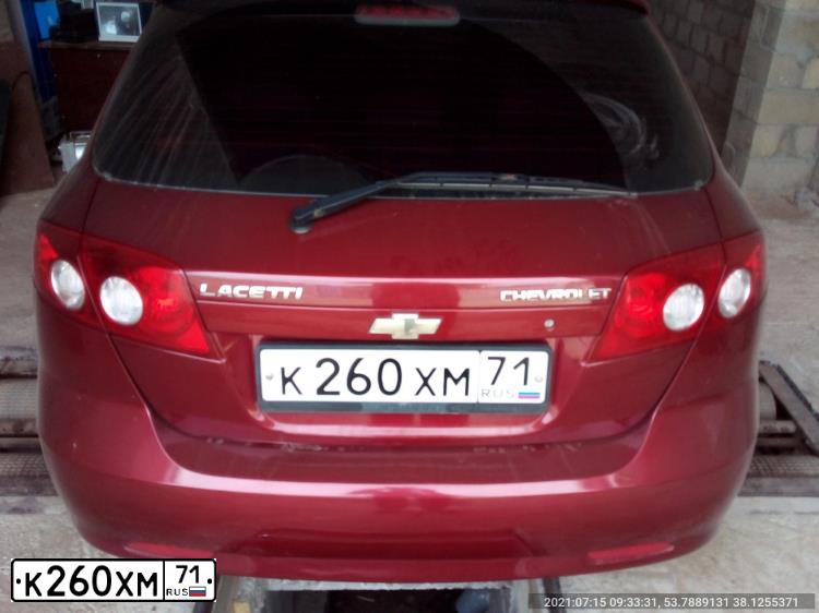 Фото автомобиля CHEVROLET LACETTI, 2008 — госномер К260ХМ71. Цвет: КРАСНЫЙ
