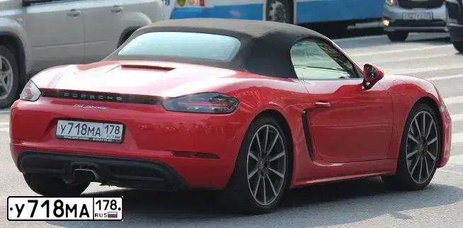Фото автомобиля PORSCHE BOXSTER, 2016 — госномер О779ТС71. Цвет: Красный