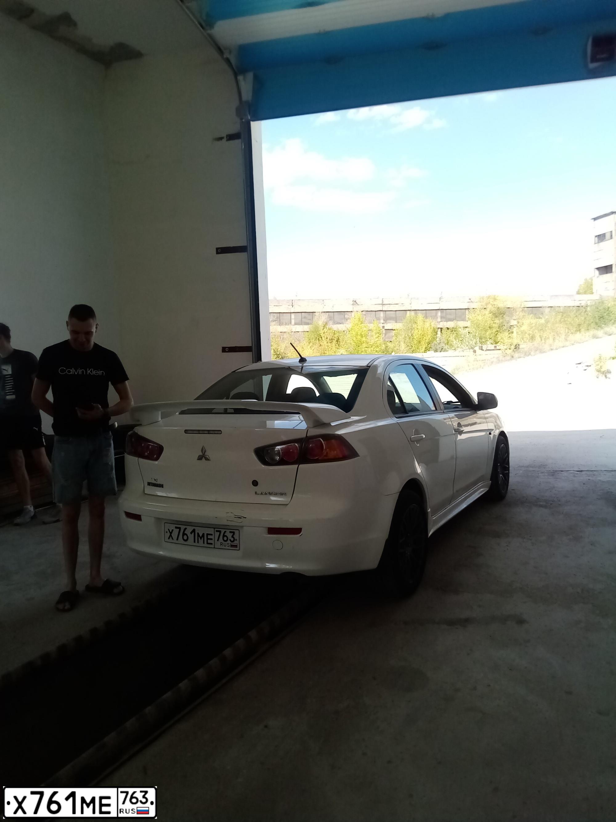 Фото автомобиля MITSUBISHI LANCER, 2008 — госномер М701ОС58. Цвет: Белый