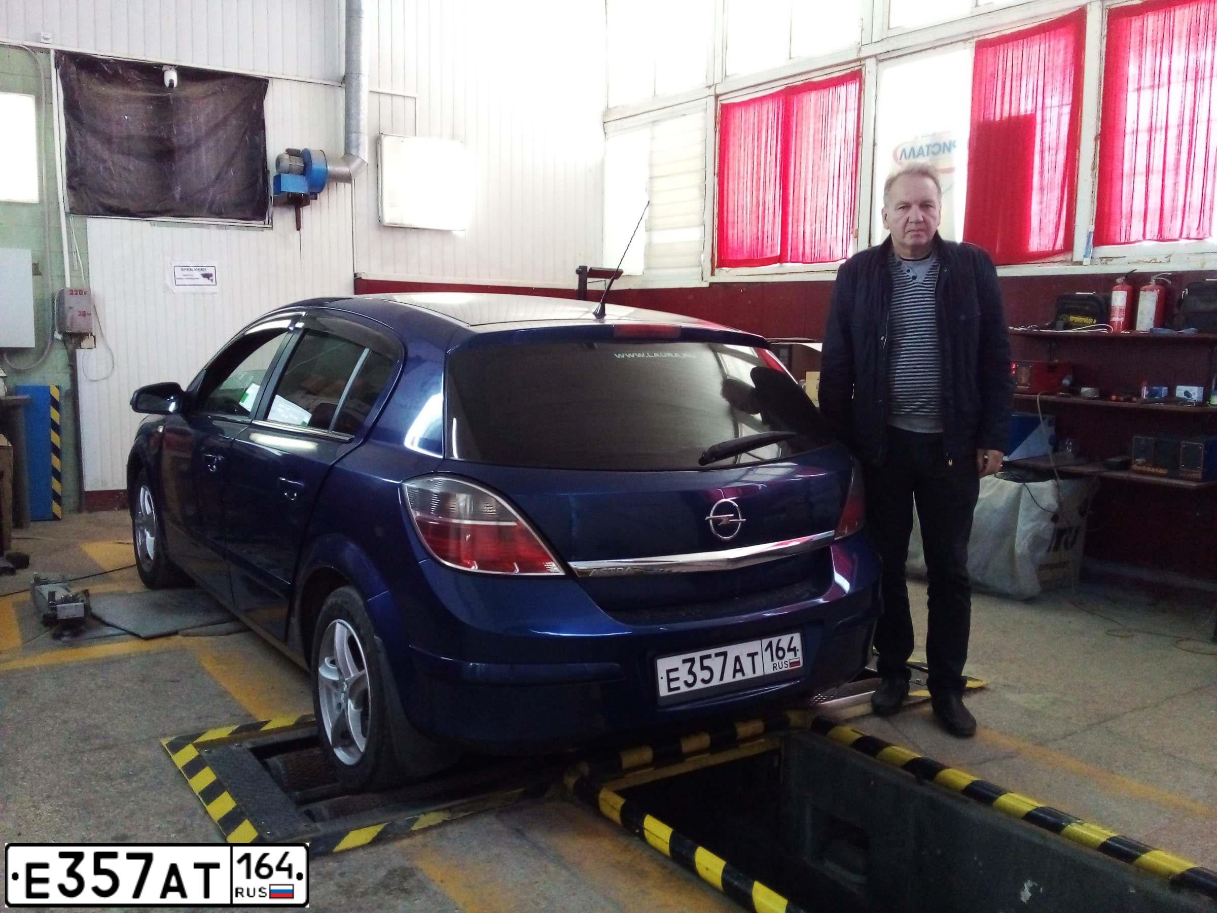 Фото автомобиля OPEL ASTRA, 2009 — госномер Н213МК82